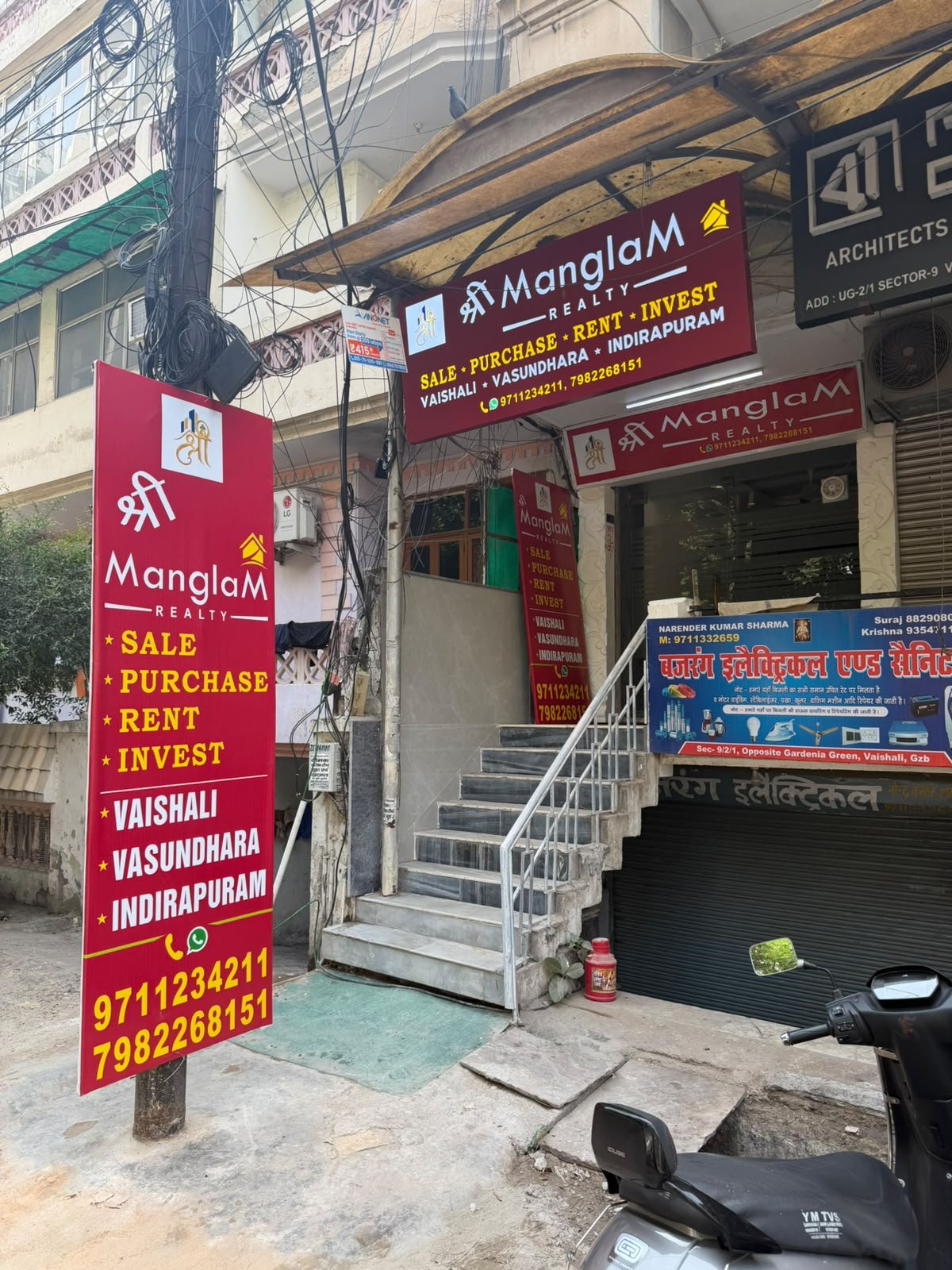 Shri Manglam Realty storefront signage
